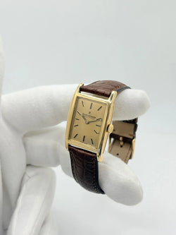 JAEGER-LECOULTRE "Tank Vintage" Watch in yellow gold, stainless steel, and leather