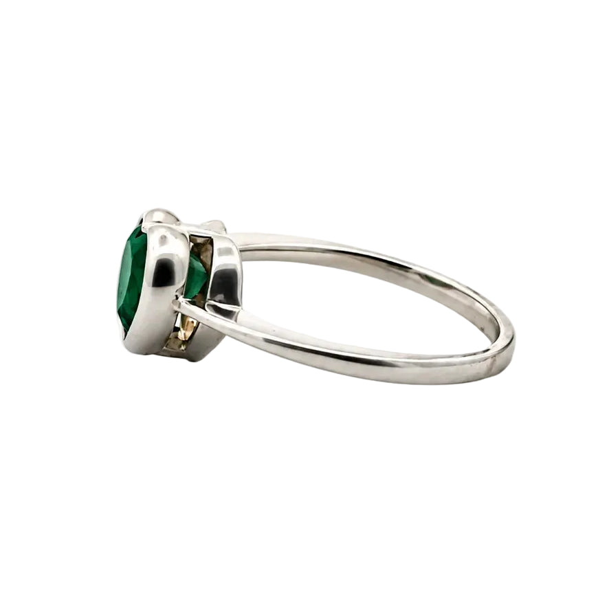 White Gold Solitaire Ring with an Emerald