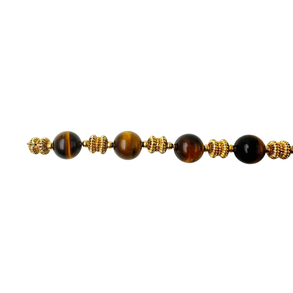 Bracelet O.J. PERRIN en or jaune et perles d'oeil de tigre
