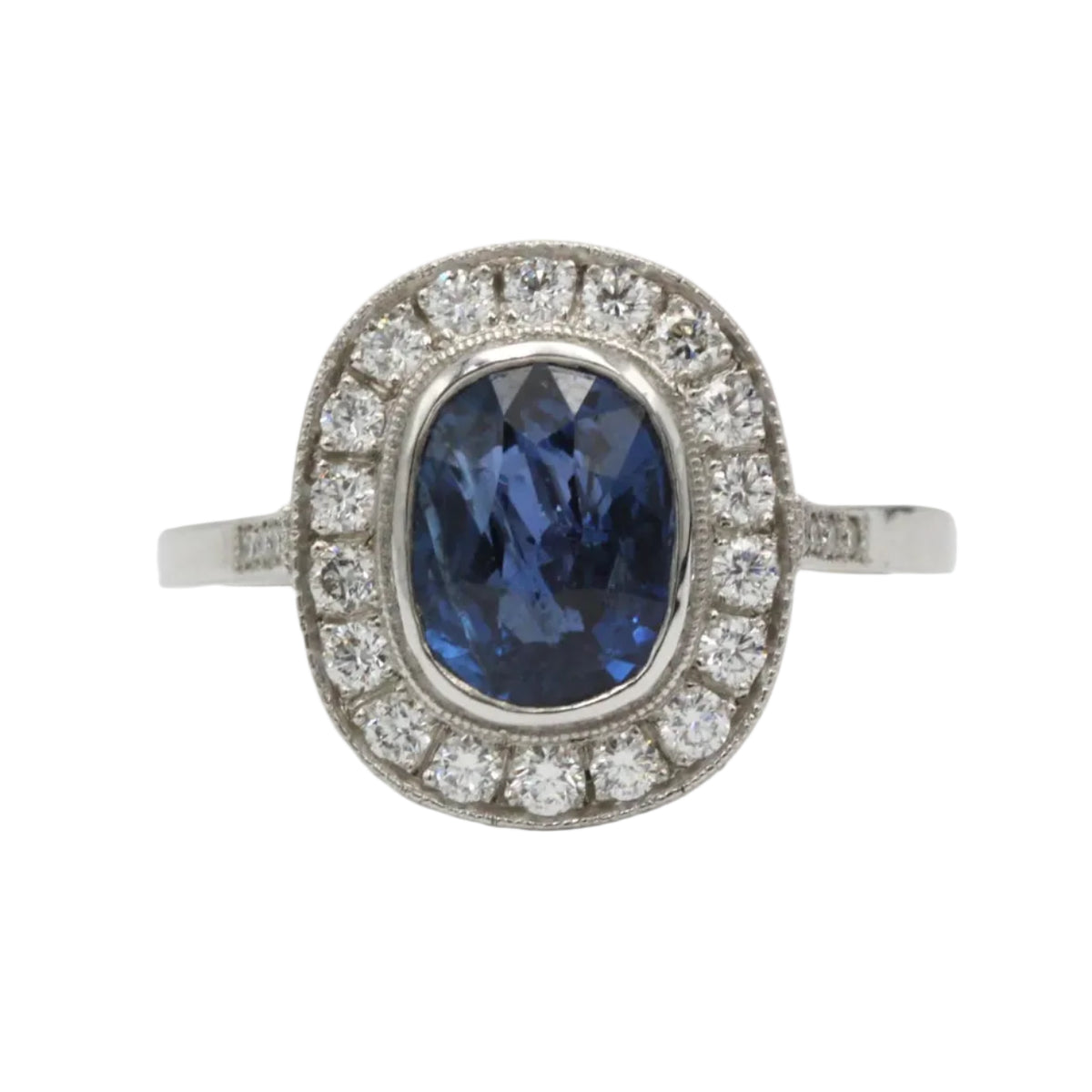 Entourage Ring in Platinum, Sapphire, and Diamonds
