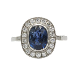 Entourage Ring in Platinum, Sapphire, and Diamonds