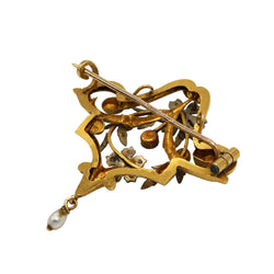 Brooch and Pendant in white gold, yellow gold, garnets, pearls, and diamonds