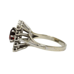 "Entourage" Ring in White Gold, Garnet, and Diamonds