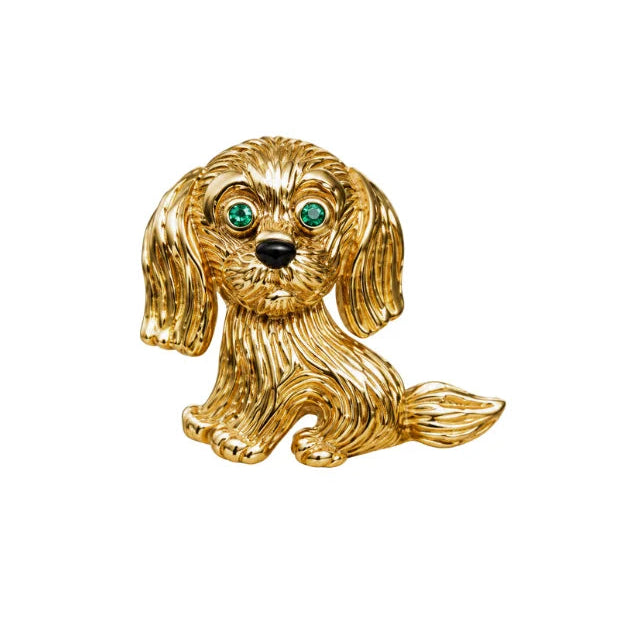 VAN CLEEF & ARPELS brooch in yellow gold, Onyx, and emeralds