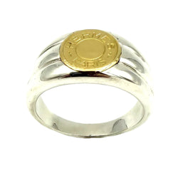 HERMÈS "Clou de selle" Signet ring in yellow gold and silver