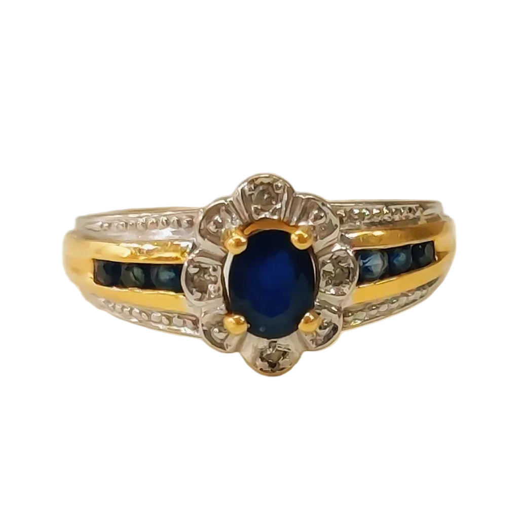 Bangle ring in white gold, yellow gold, sapphire, and diamonds