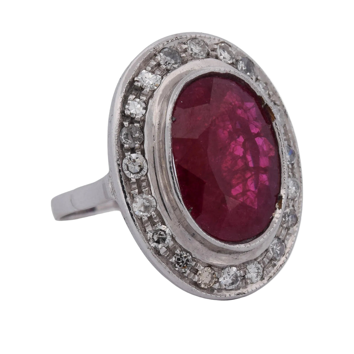 Entourage Ring in white gold, rubies, and diamonds