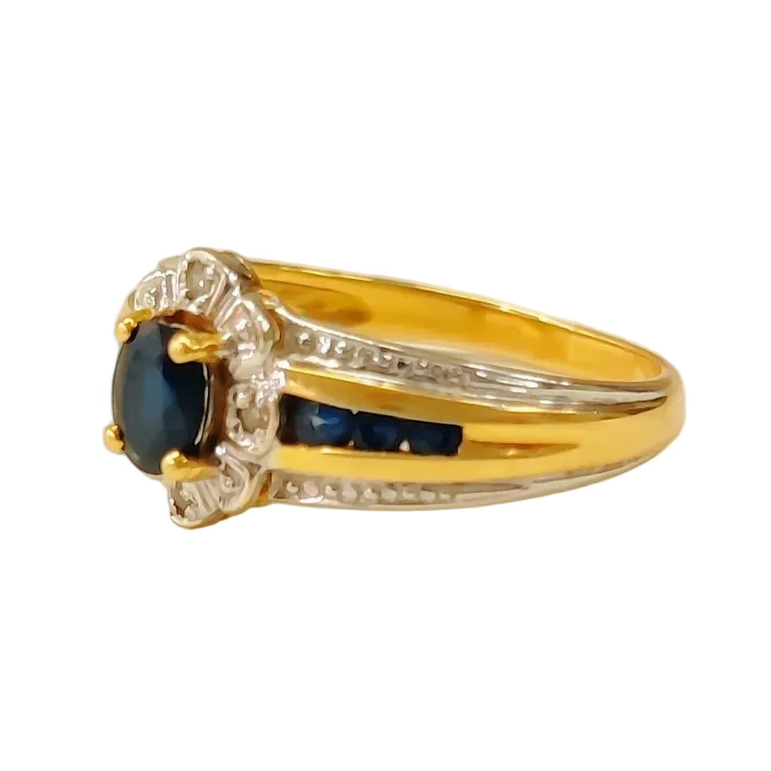 Bangle ring in white gold, yellow gold, sapphire, and diamonds