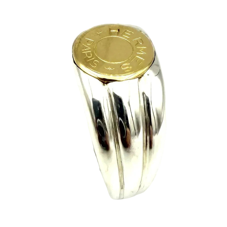 HERMÈS "Clou de selle" Signet ring in yellow gold and silver