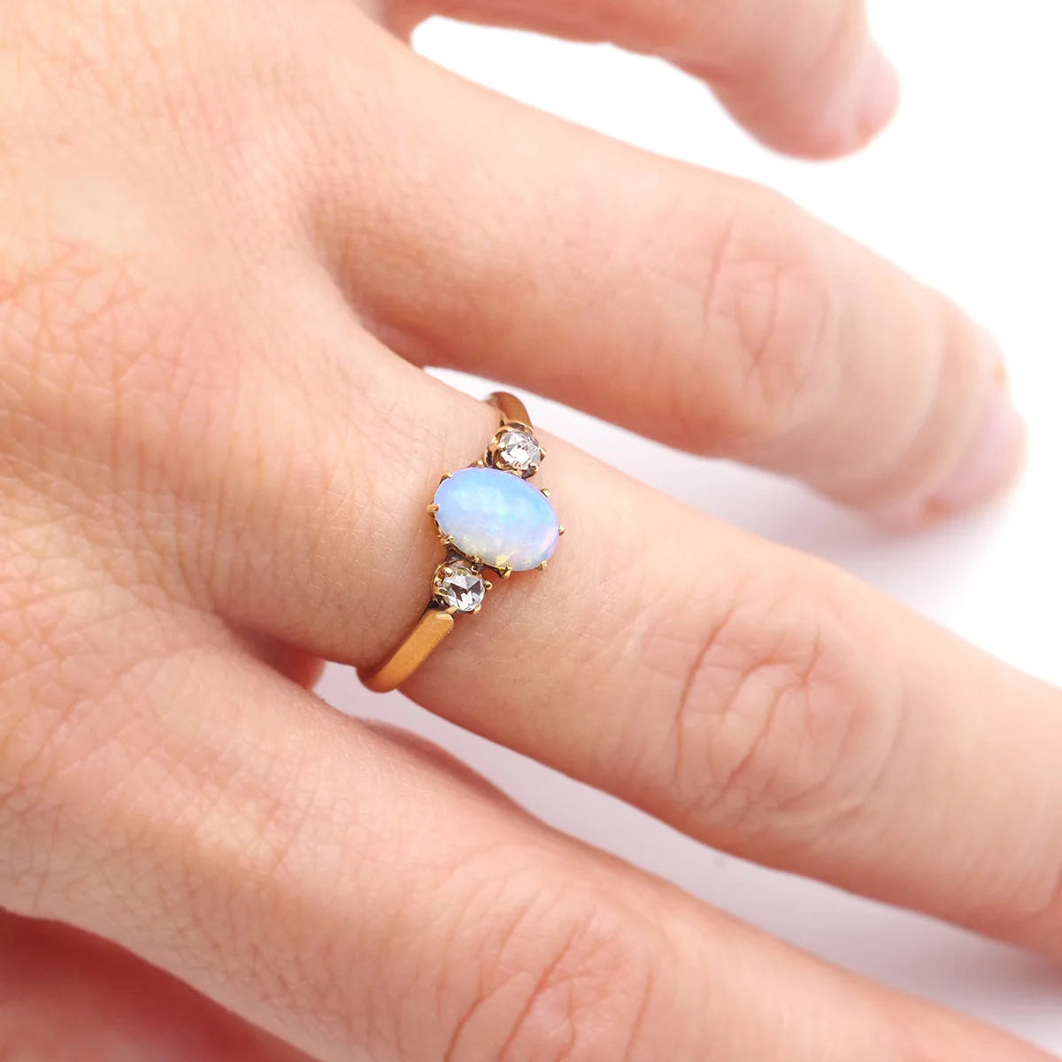 Trilogy Ring in Yellow gold, Opal, and Diamonds