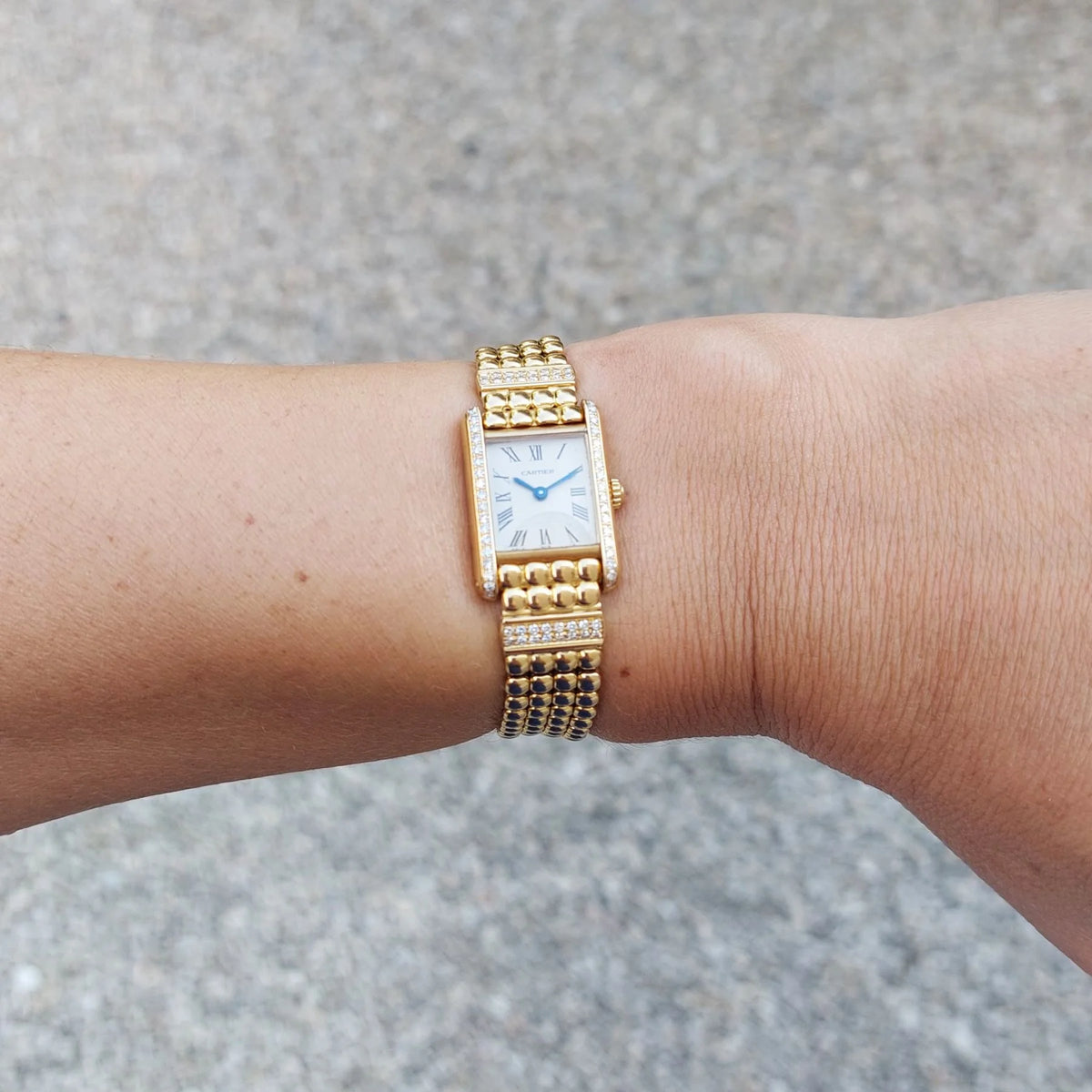 CARTIER "Tank Louis Cartier Mini" watch in yellow gold and diamonds