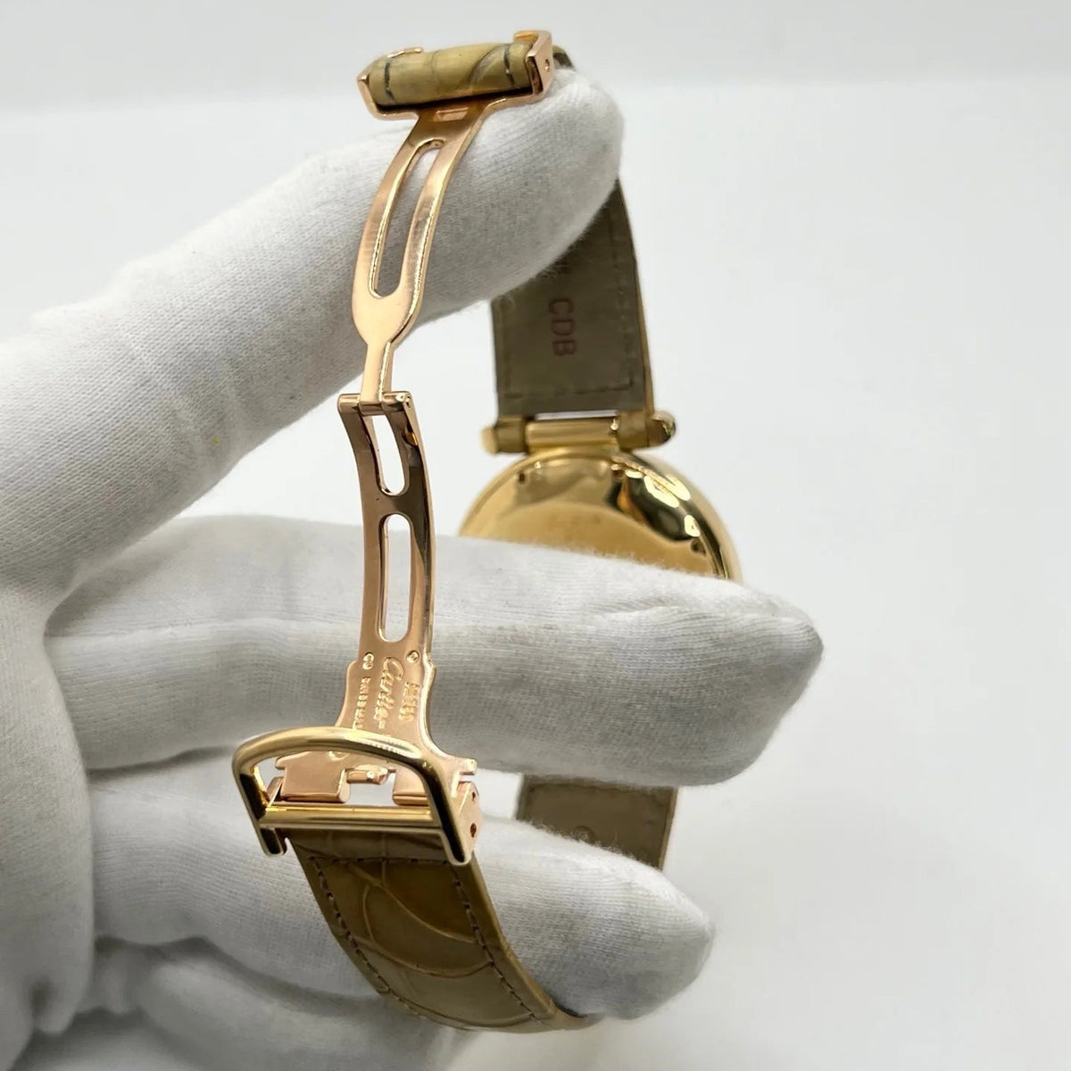 Montre CARTIER Pasha en or jaune, or rose, cuir et diamants
