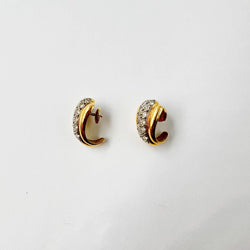 Earrings in white gold, yellow gold, and diamonds