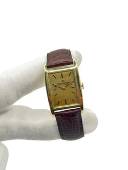 JAEGER-LECOULTRE "Tank Vintage" Watch in yellow gold, stainless steel, and leather