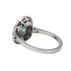 Entourage Ring in Platinum, Sapphire, and Diamonds