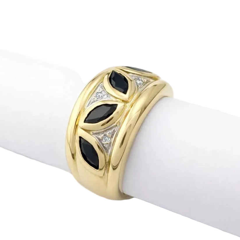 Band Ring in white gold, yellow gold, sapphires, and diamonds