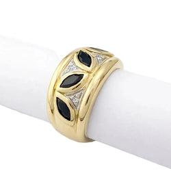 Band Ring in white gold, yellow gold, sapphires, and diamonds