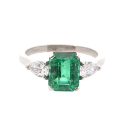 Trilogy Ring in Platinum, Emerald, and Diamonds