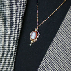 Collier Pendentif en or jaune, or rose, perles et diamants