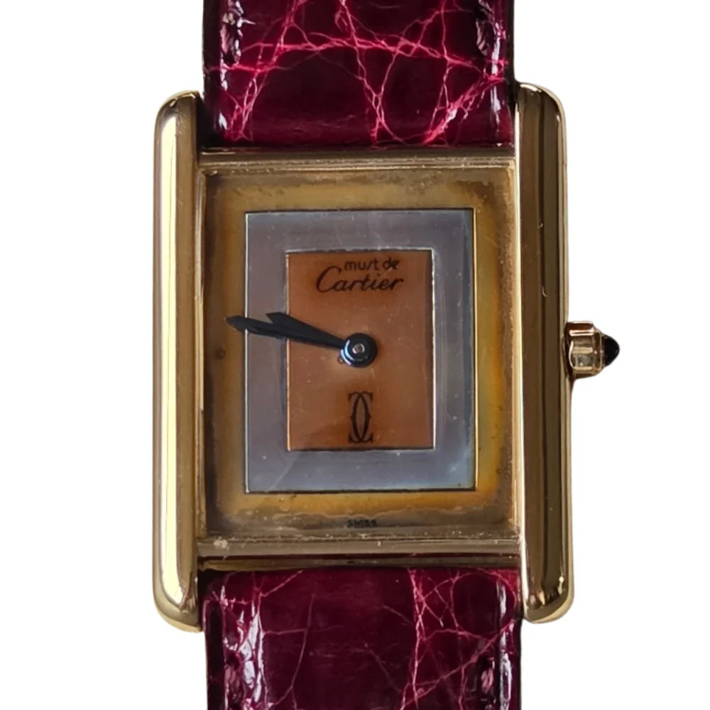 Montre CARTIER Tank en vermeil et cuir