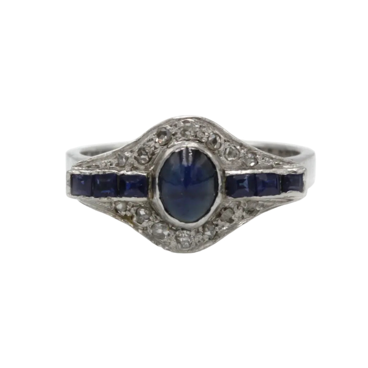 White gold ring with sapphires and diamonds