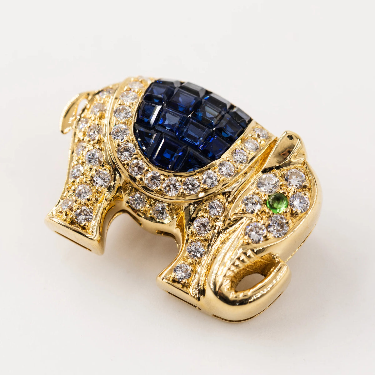 "Elephant" brooch in yellow gold, diamonds, and sapphires