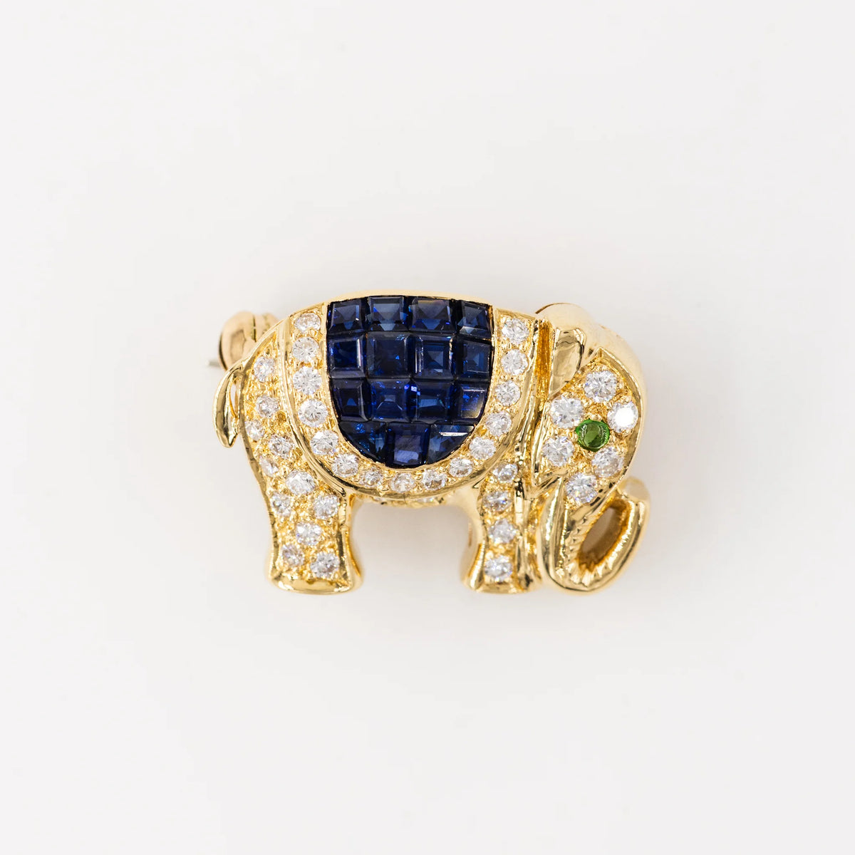"Elephant" brooch in yellow gold, diamonds, and sapphires