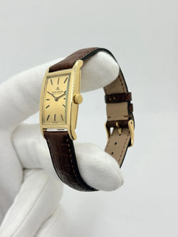 JAEGER-LECOULTRE "Tank Vintage" Watch in yellow gold, stainless steel, and leather