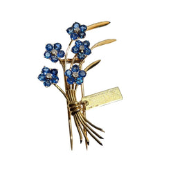 VAN CLEEF & ARPELS "Ne m'oubliez pas" Clip Brooch in yellow gold, sapphires, and diamonds