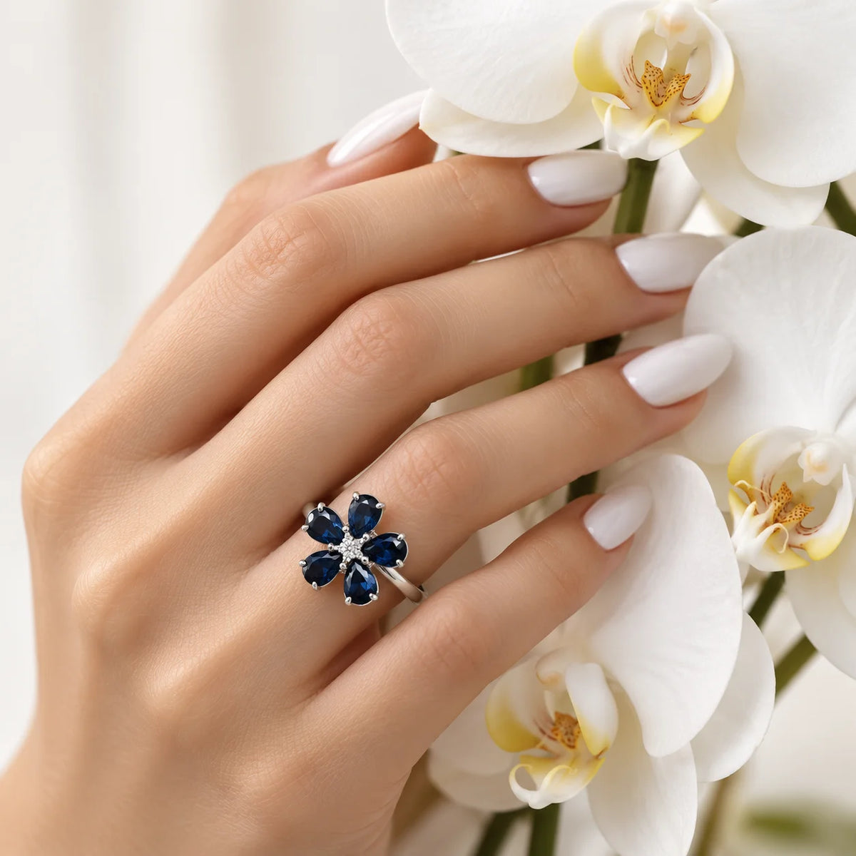 Cocktail Ring in White Gold, Sapphires, and Diamond