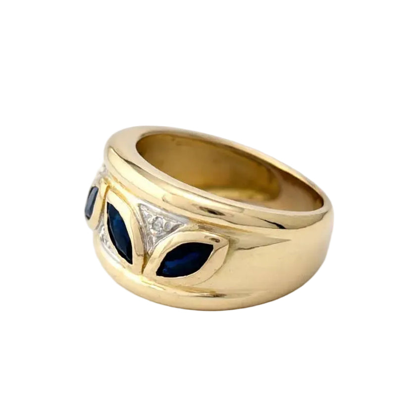 Band Ring in white gold, yellow gold, sapphires, and diamonds