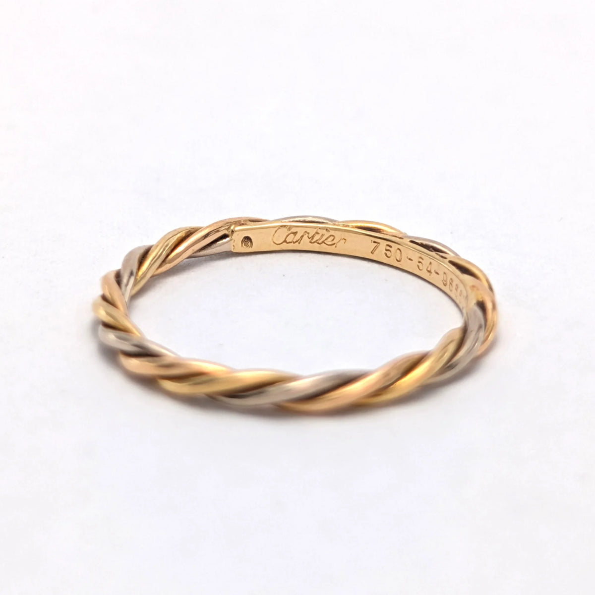 CARTIER Wedding band in white gold, yellow gold, and rose gold