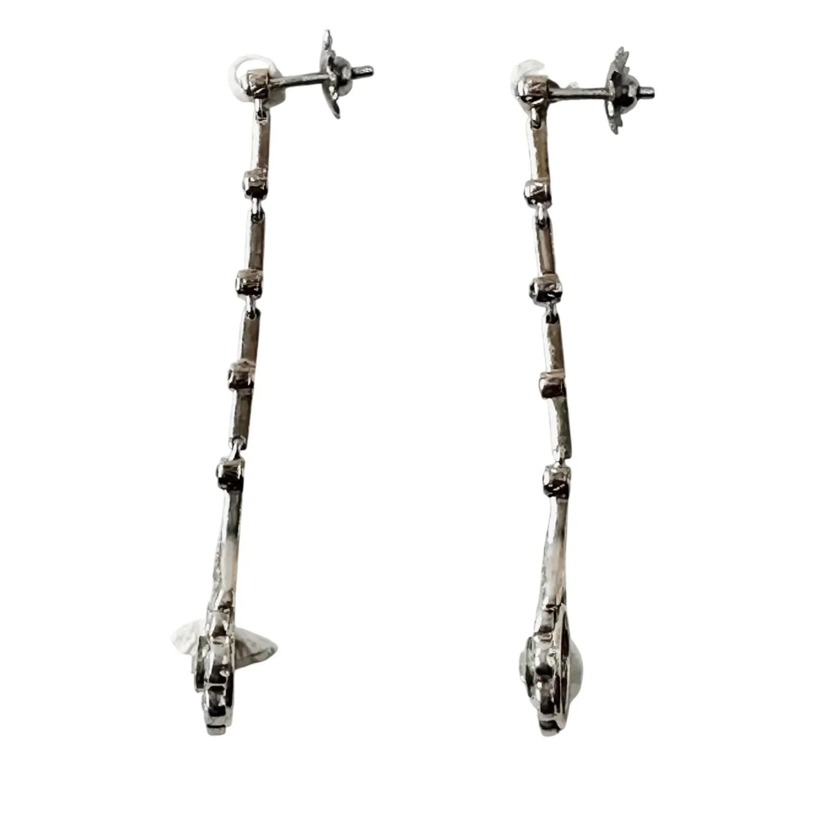 Belle Époque earrings in platinum, yellow gold, and diamonds