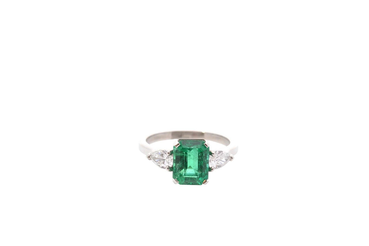 Trilogy Ring in Platinum, Emerald, and Diamonds