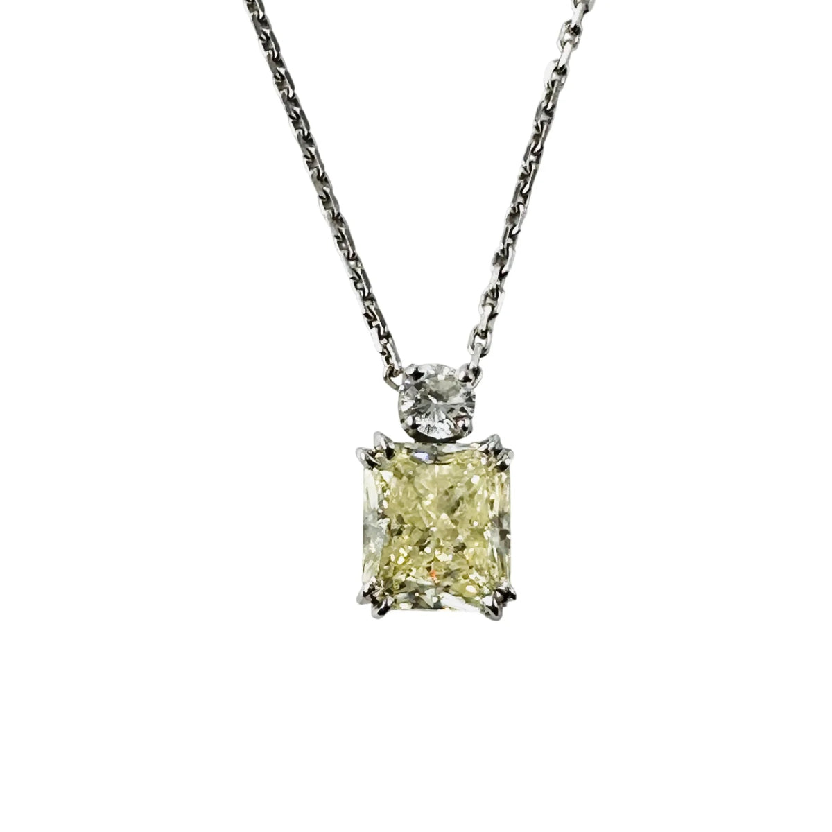 White Gold Necklace with a Pendant Featuring a Fancy Yellow Diamond and a Diamond