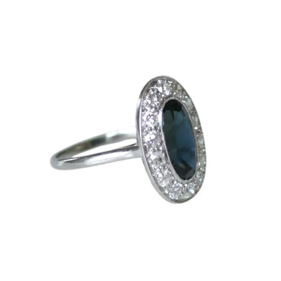 Entourage Ring in Platinum, Sapphire, and Diamonds