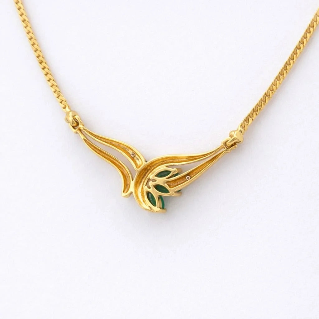 Collier Pendentif en or blanc, or jaune, émeraudes et diamants