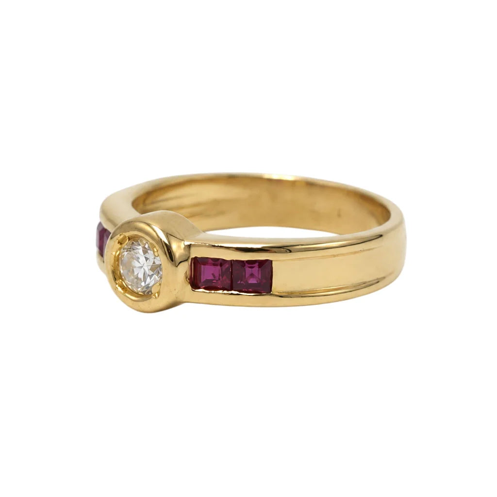 Yellow gold ring with rubies and diamonds