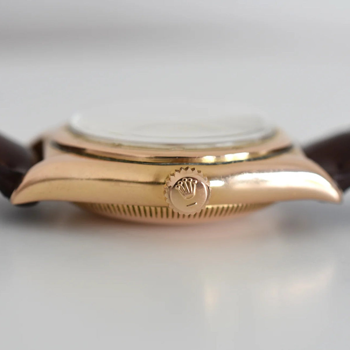 ROLEX "Perpetual Ovetto Bubbleback" watch in rose gold and leather