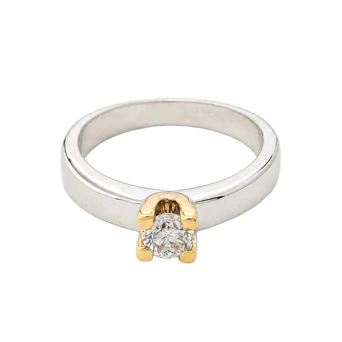 Solitaire Ring in White gold, Yellow gold, and Diamond