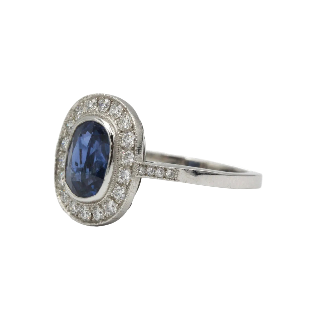 Entourage Ring in Platinum, Sapphire, and Diamonds