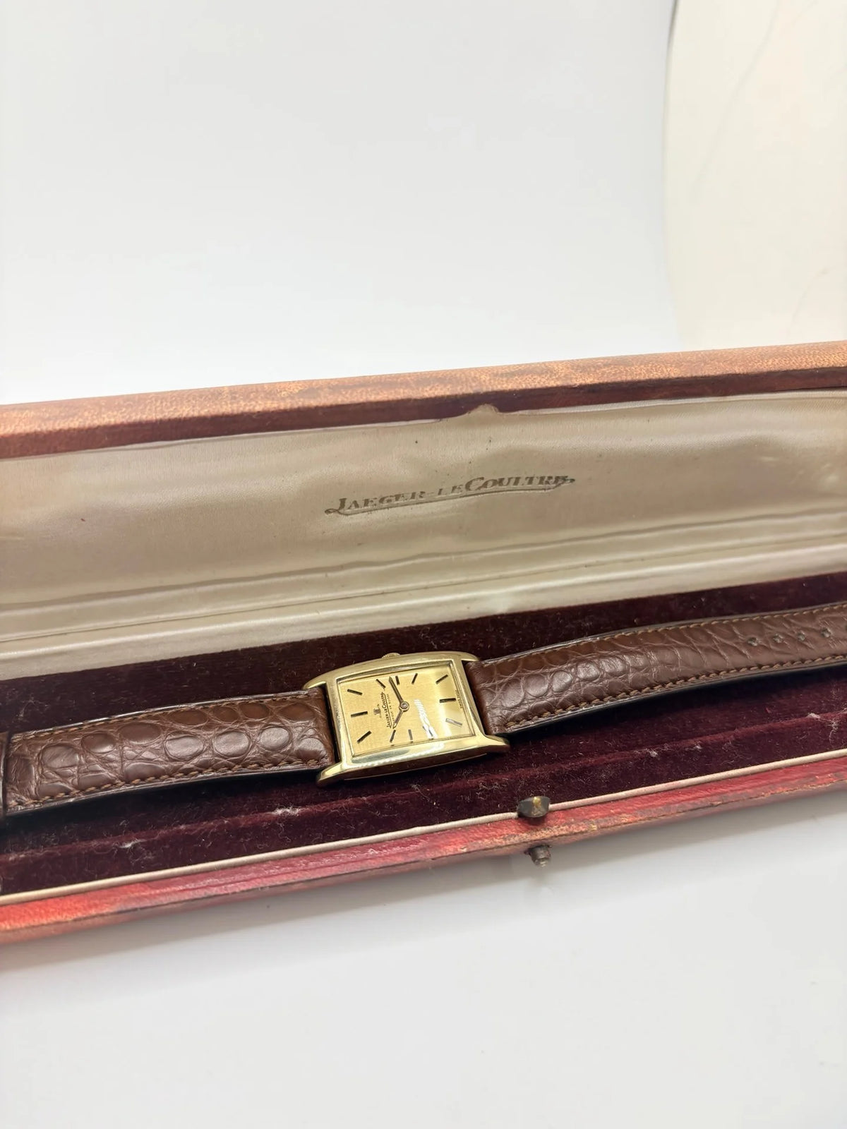 JAEGER-LECOULTRE "Tank Vintage" Watch in yellow gold, stainless steel, and leather