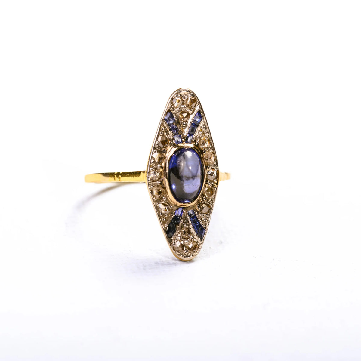Art Deco marquise ring in multicolored gold, synthetic sapphires, and diamonds