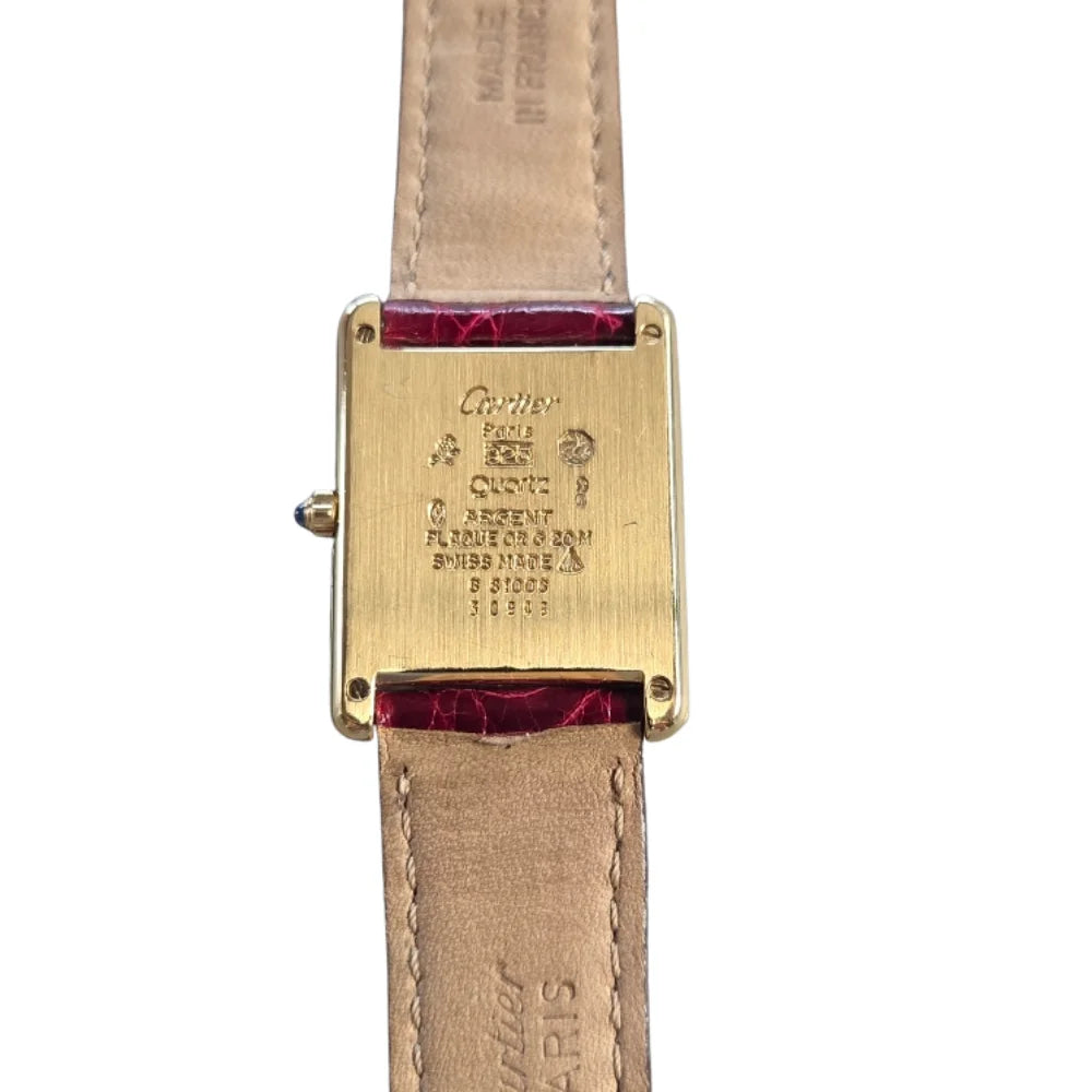 Montre CARTIER Tank en vermeil et cuir