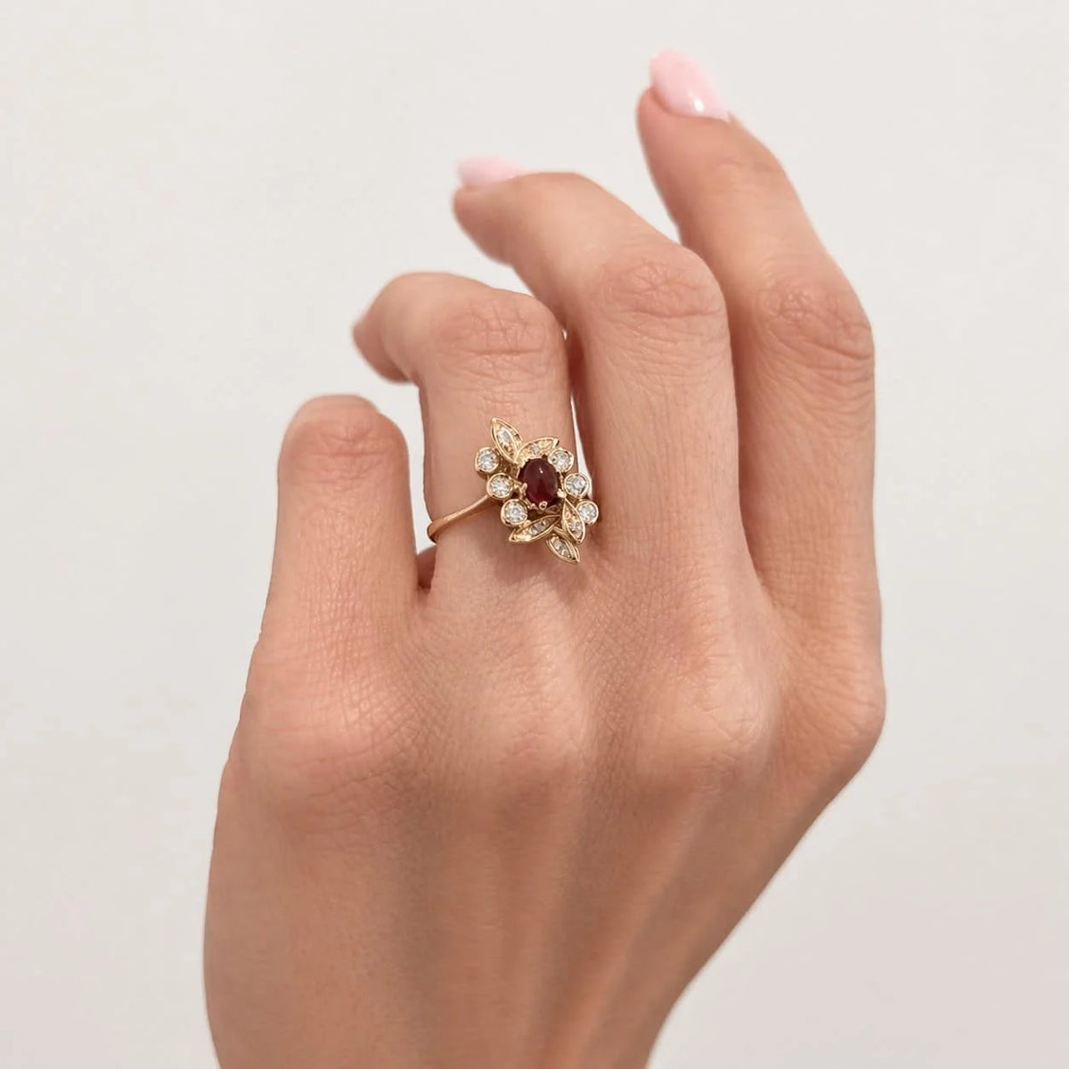 Entourage Ring in yellow gold, rubies, and diamonds
