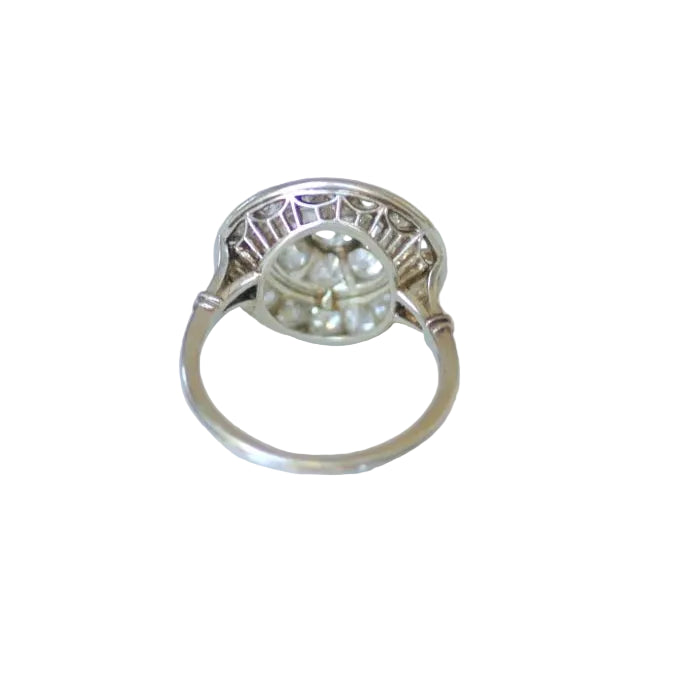 Entourage Ring in white gold, Platinum, and Diamonds