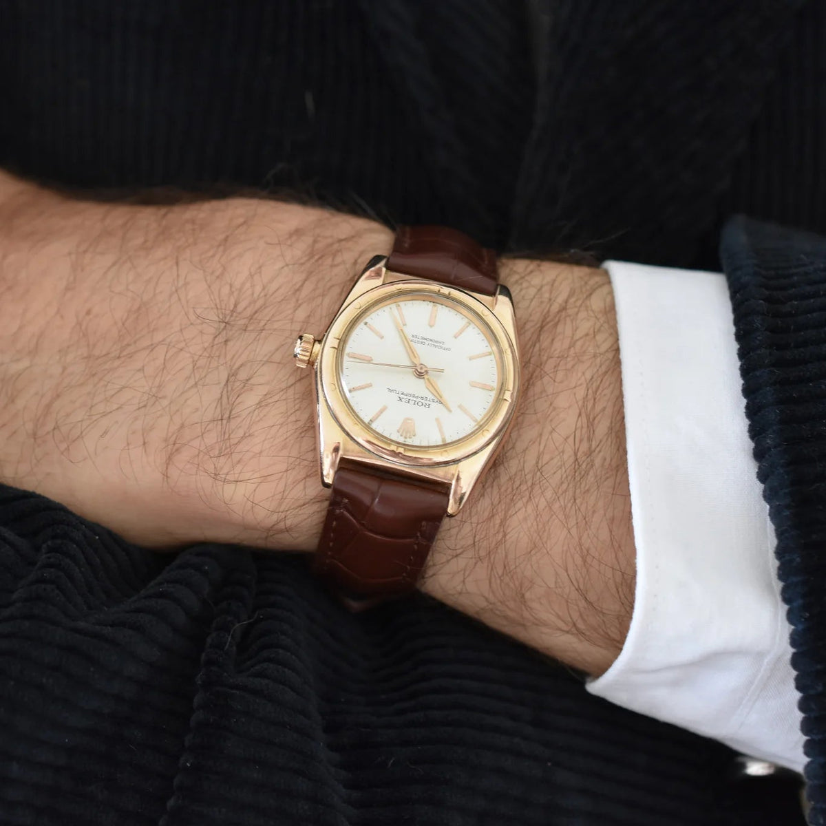 ROLEX "Perpetual Ovetto Bubbleback" watch in rose gold and leather