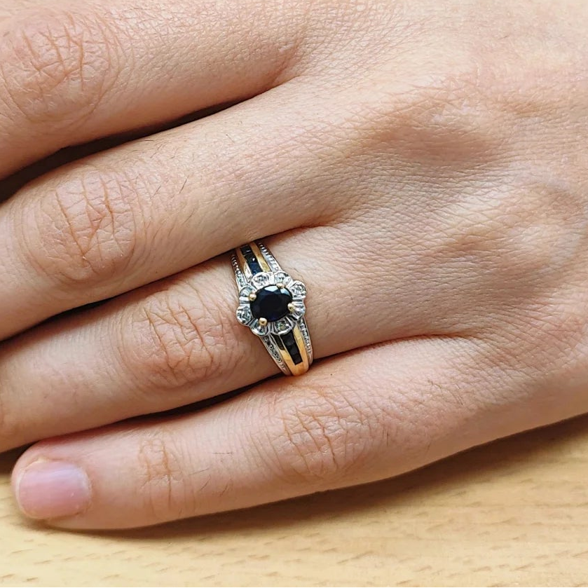 Bangle ring in white gold, yellow gold, sapphire, and diamonds