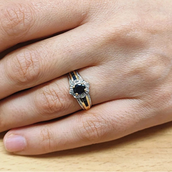 Bangle ring in white gold, yellow gold, sapphire, and diamonds