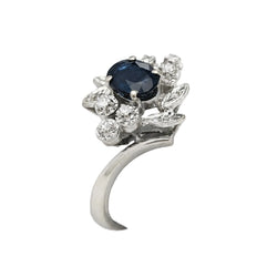 Entourage Ring in white gold, sapphire, and diamonds
